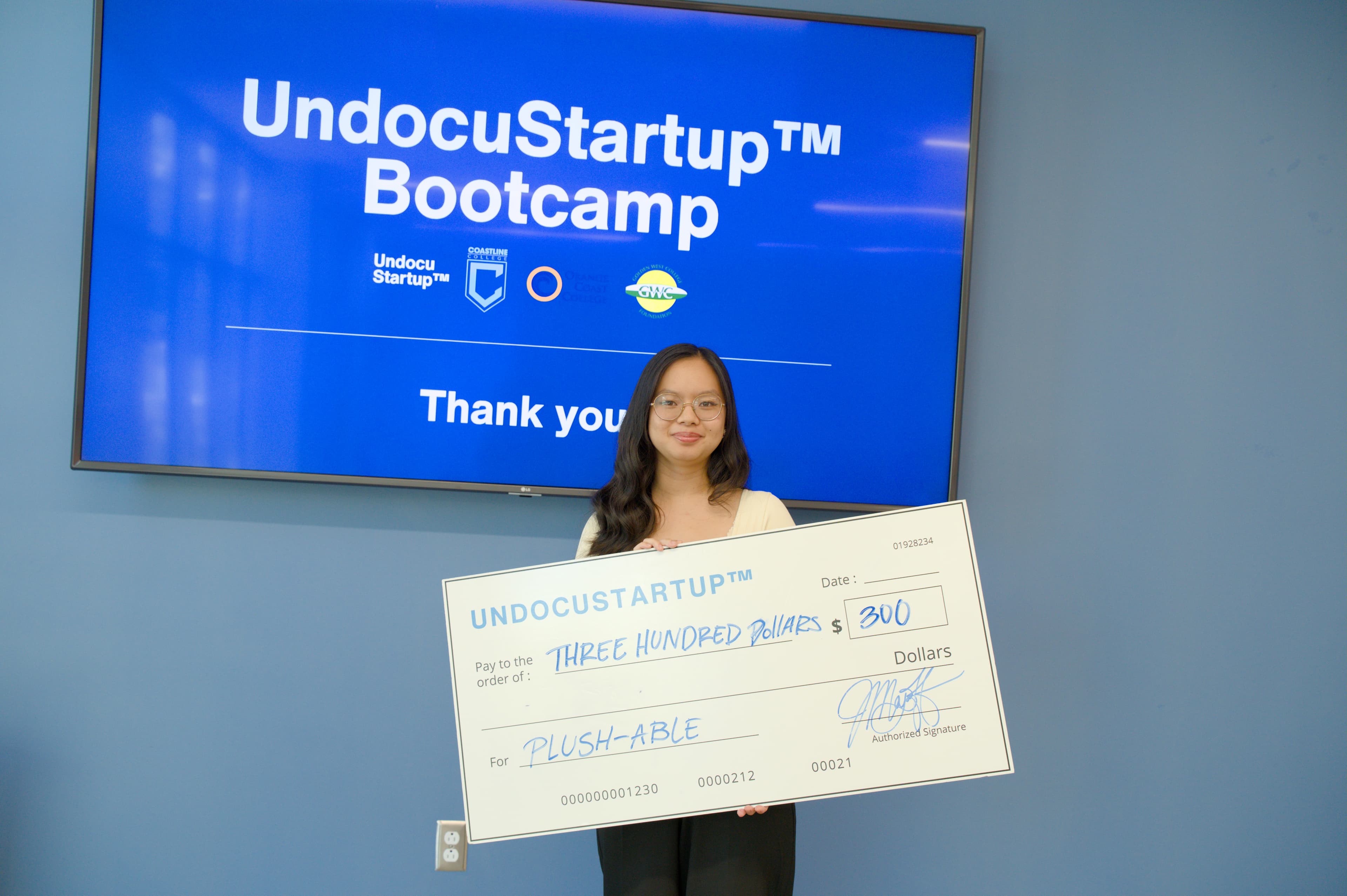 Scholarship winner celebrating after an UndocuStartup event